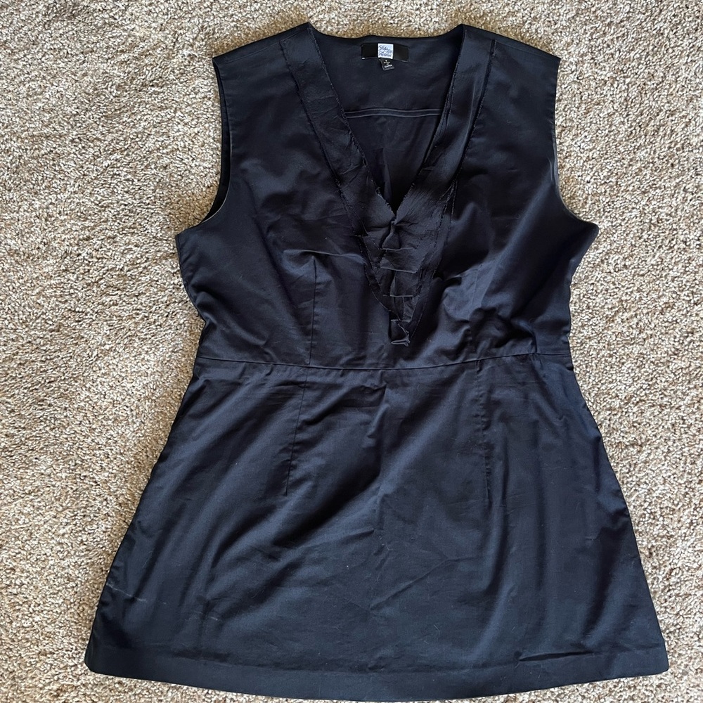 Black Sacks Fifth Avenue Women’s Top. Zips on the side.